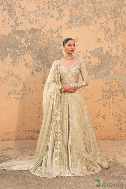 Full length view of model wearing olive green front open gown with lehenga in masuri fabric with scalloped metallic dupatta