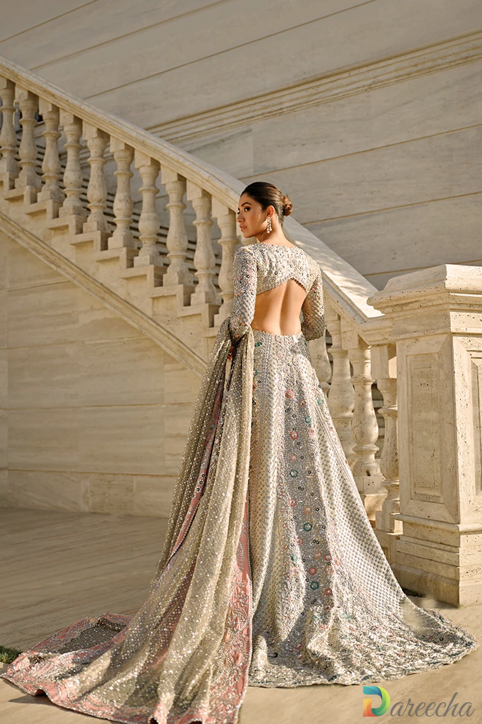 Plunging V neckline with sequin and pearl work