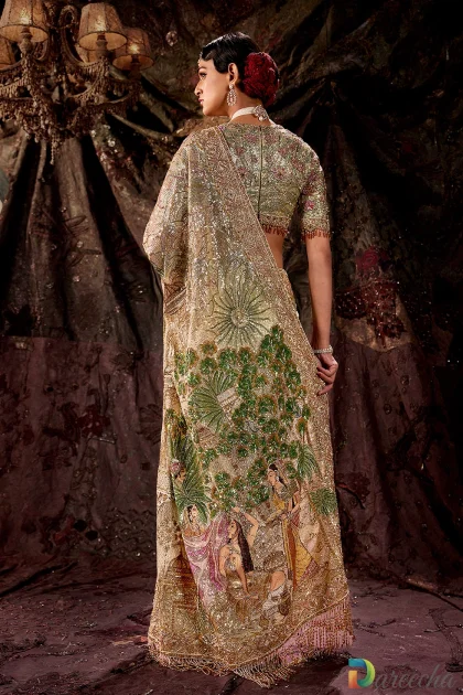 Full length view of pale pistachio green tulle saree with hand embroidered miniature artwork pallu