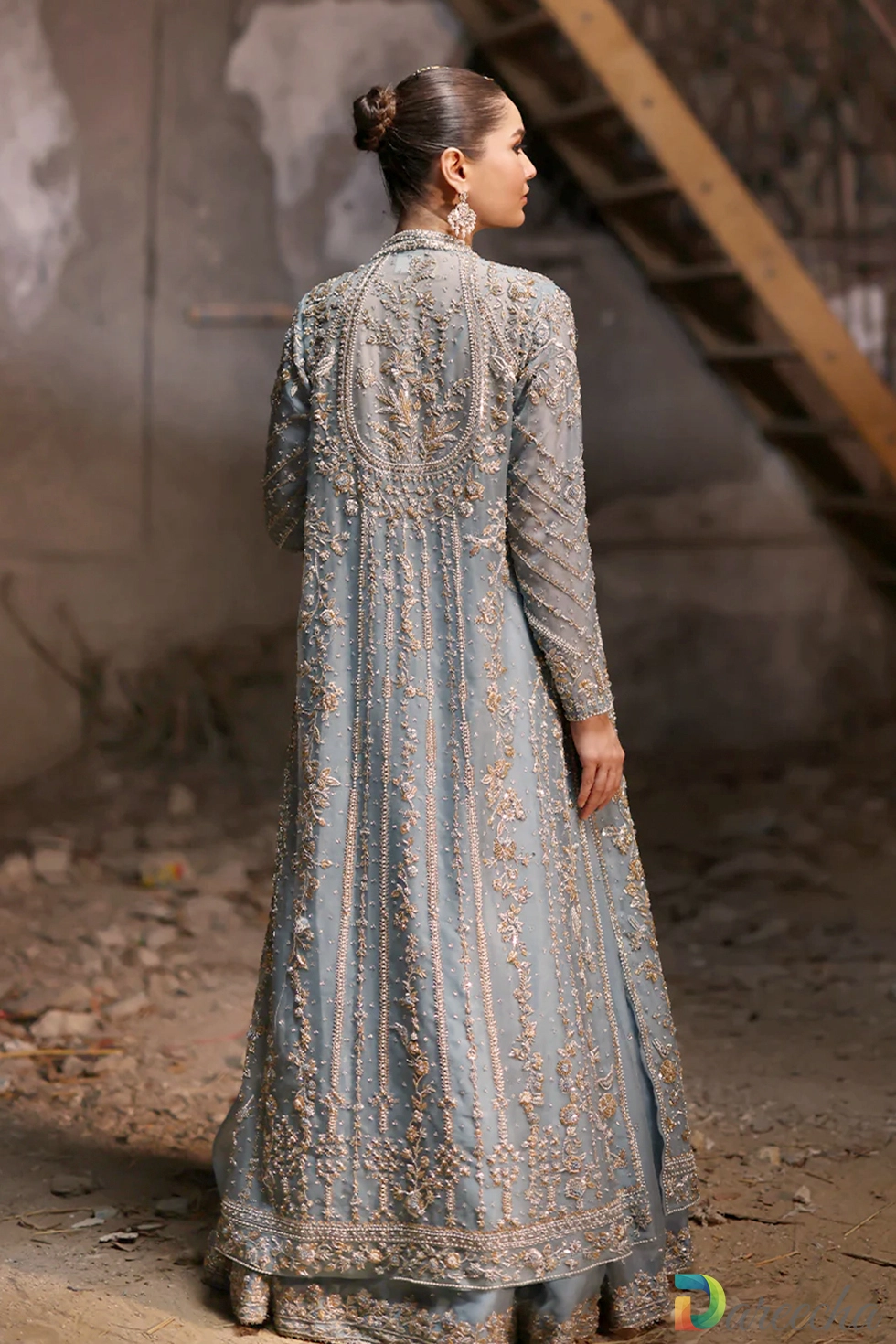 Back view showing intricate zardozi back medallion embroidery on powder blue front open lehenga jacket