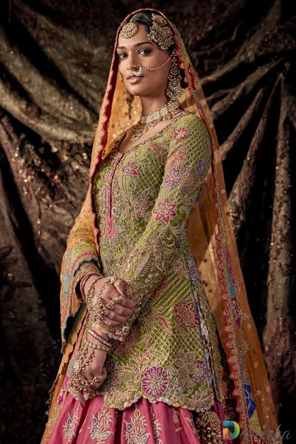 Upper body view highlighting marodi ka kaam embroidery on green kurti top with long sleeves and floral motifs[cite: 9]