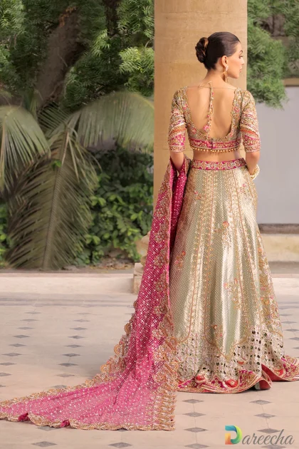 Back view of celadon and mulberry tissue bridal lehenga with scalloped choli and beaded tassels