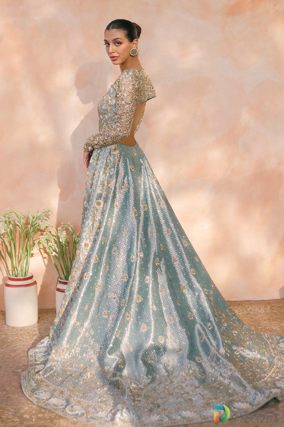 Full length front portrait of mint green tissue peshwas showing scalloped zardoze dupatta border and tissue lehenga hem