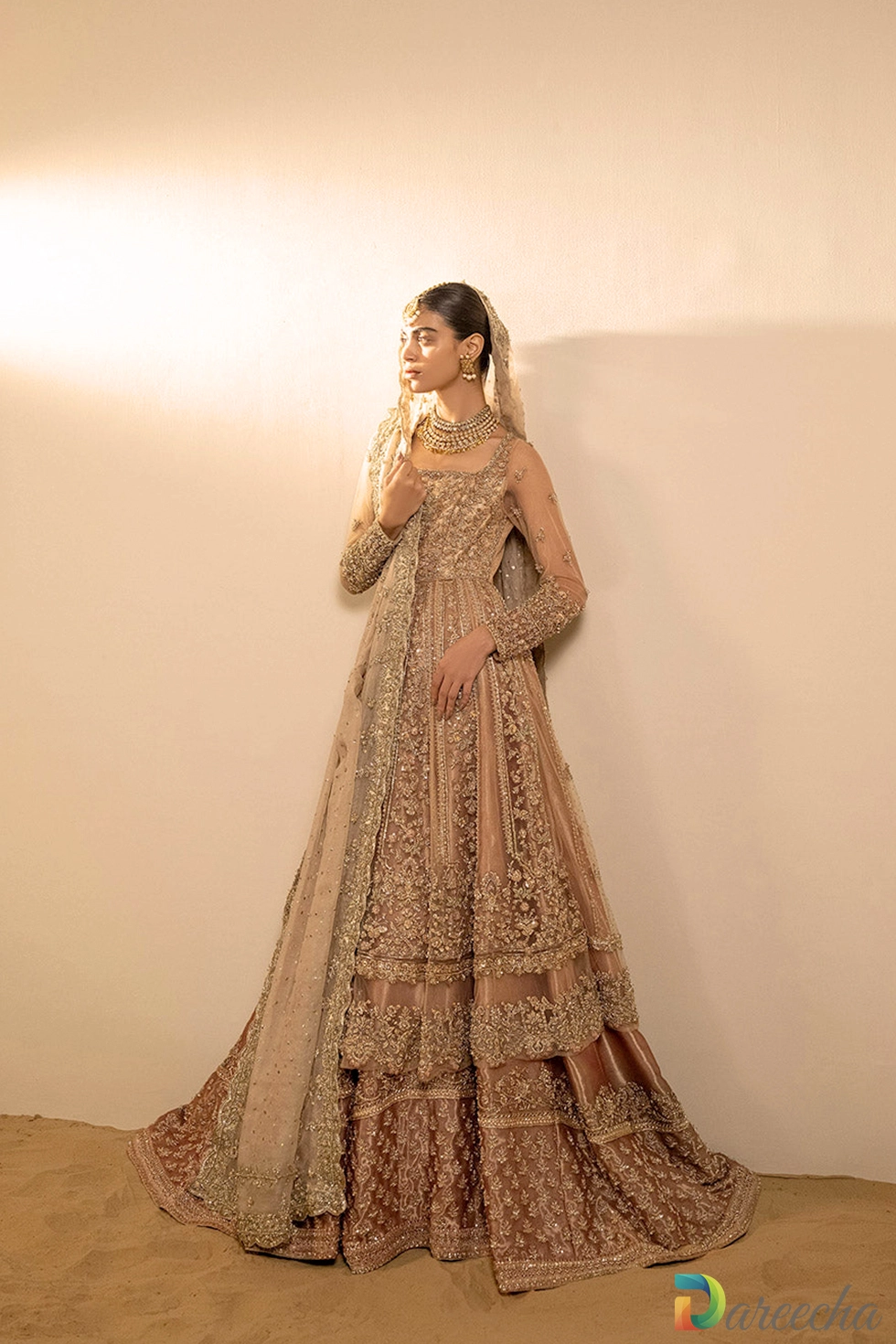 Full length view of dusty pink pishwas and sharara