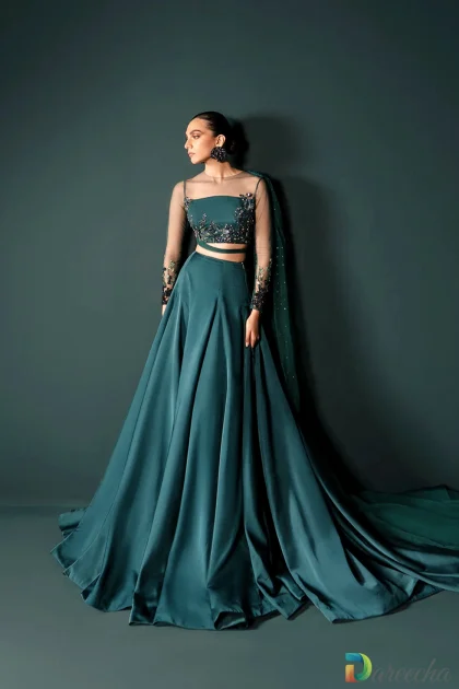 Sea green silk lehenga with sweeping trail skirt