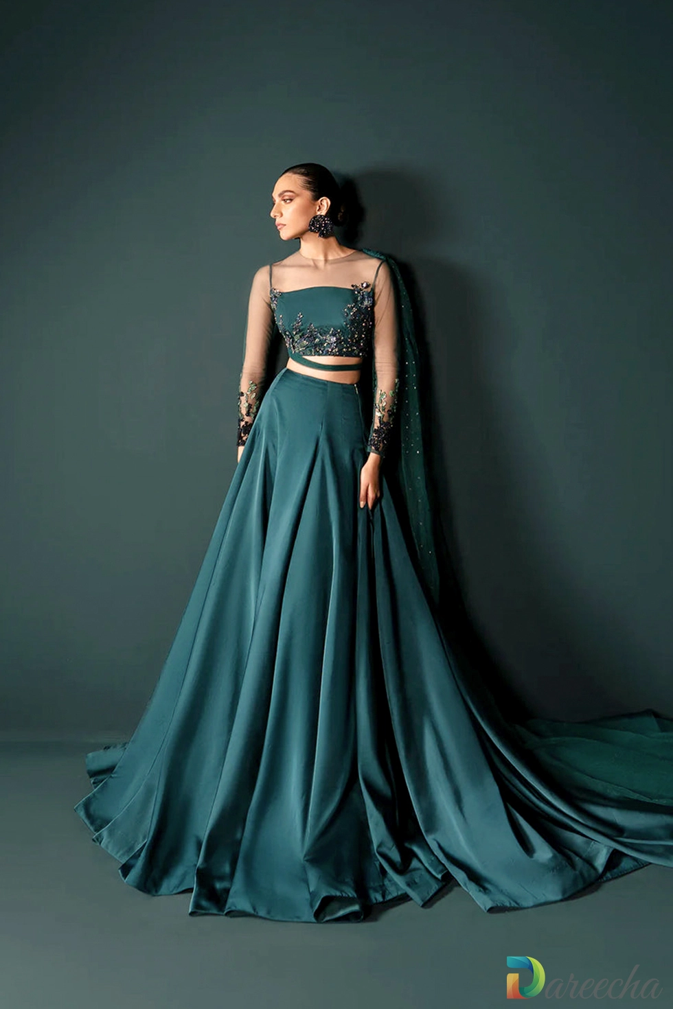 Sea green silk lehenga with sweeping trail skirt