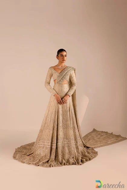Gold bridal lehenga with train and attached drape