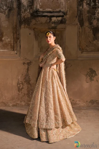 Dusty pink bridal peshwas side view with organza drape