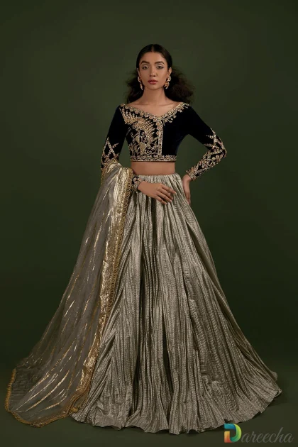 Teal velvet lehenga choli with crushed tissue skirt