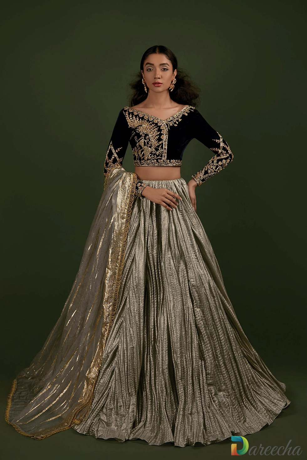 Teal velvet lehenga choli with crushed tissue skirt