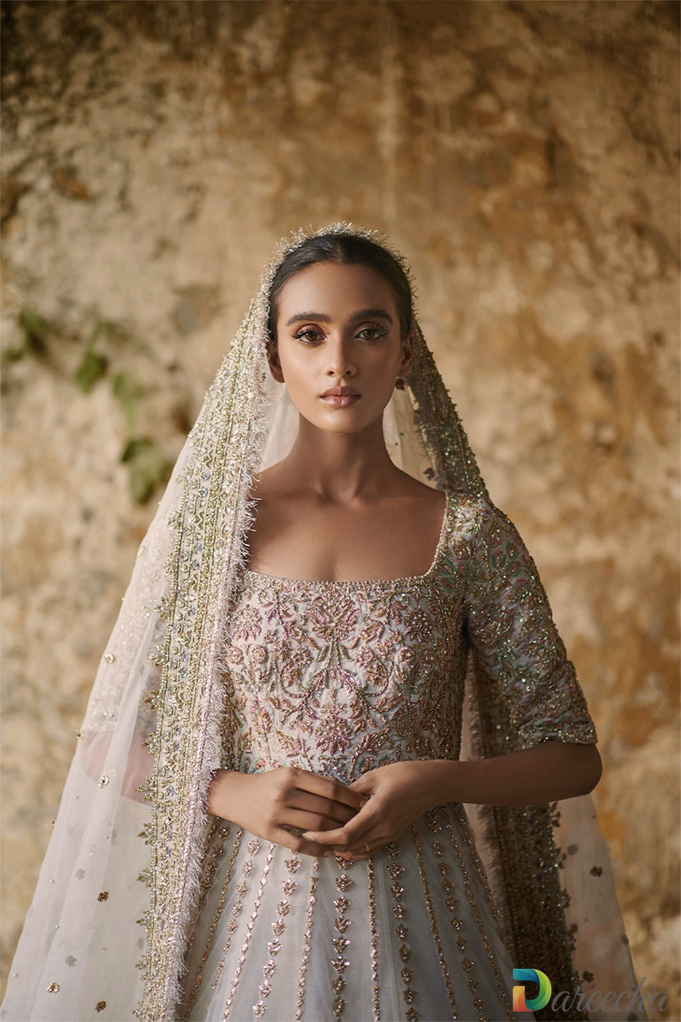 White pishwas with lehenga close up view with zardozi
