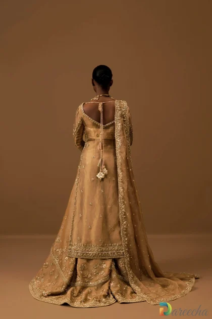 Full back view of long gold embellished shirt