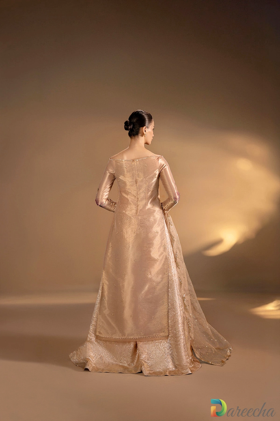 Back view of champagne tissue shirt and silk brocade pants Back view of champagne tissue shirt and silk brocade pants