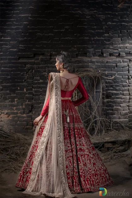 Back view of red raw silk choli and nude pink dupatta