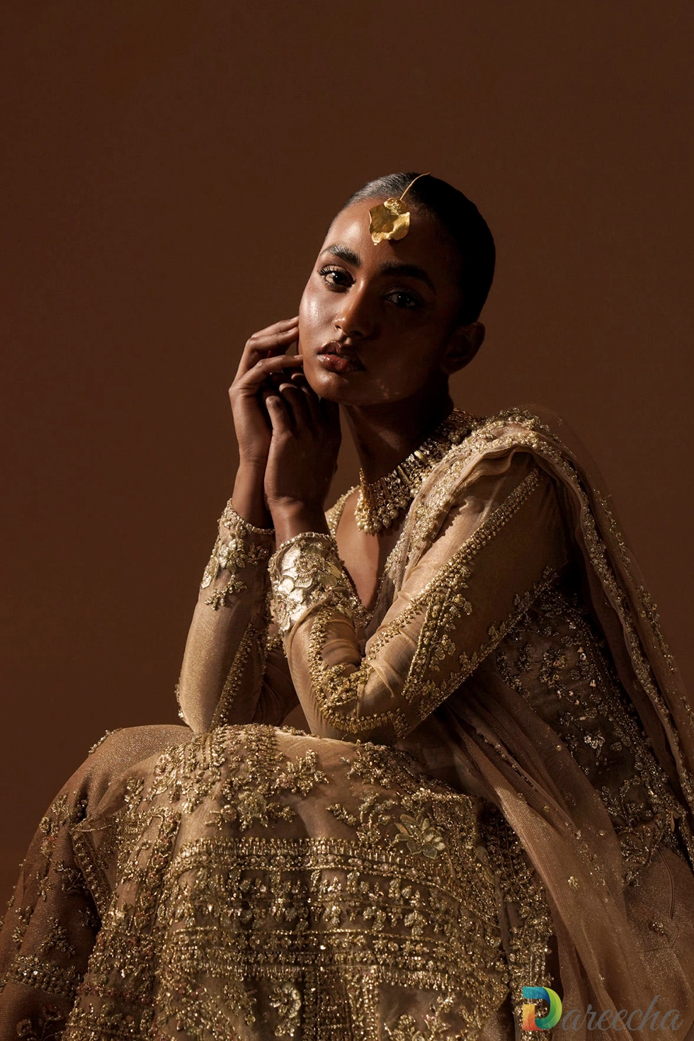 Close up of zardozi embroidery and square neck