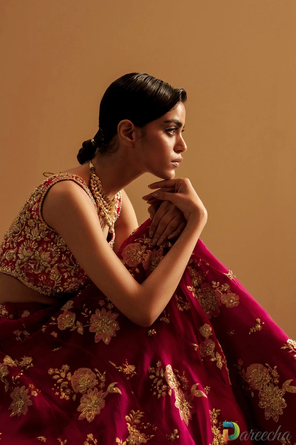 Close up pose showing detailed zardozi work on choli