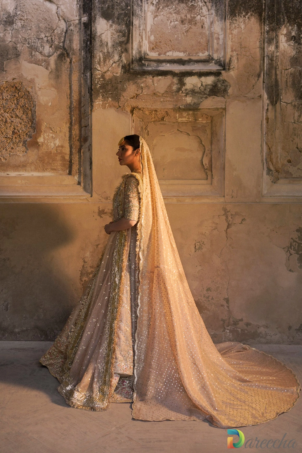 Front view displaying flared peshwas and kiran edging Front view displaying flared peshwas and kiran edging